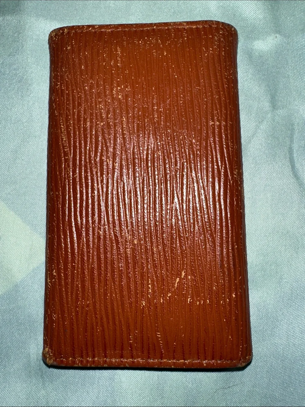 Louis Vuitton Embossed Epi Leather Card Holder in Brown